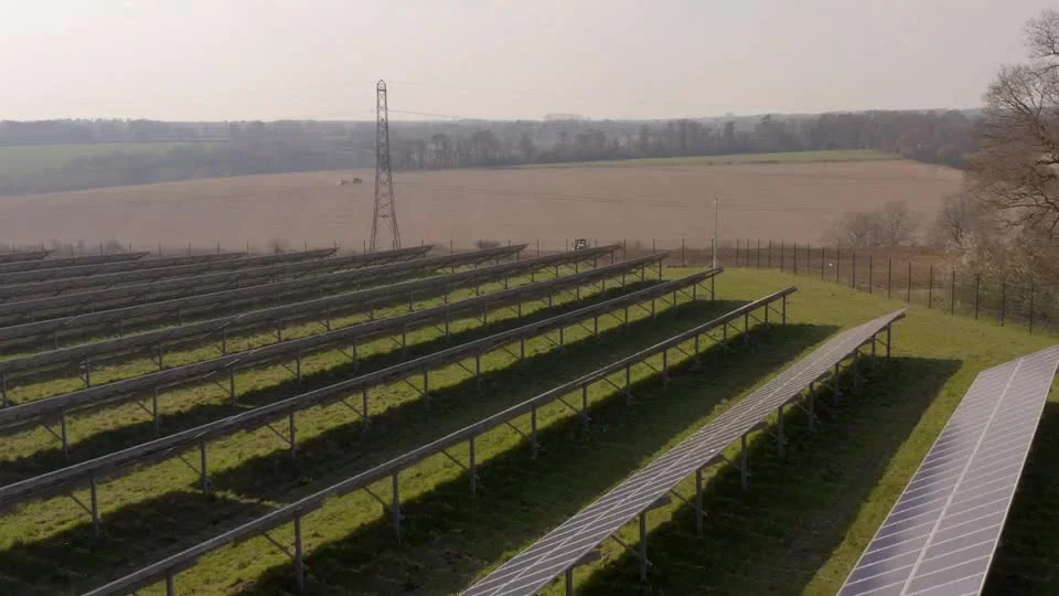 Rows of solar panels at a PowerField Energy installation